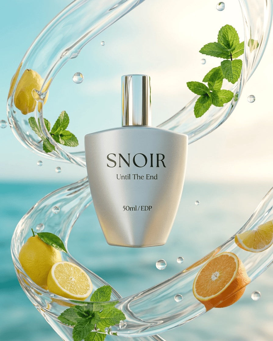 Snoir perfume bottle with lemons and mint leaves on a light blue background