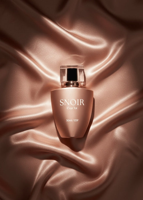 Snoir skincare bottle on a textured brown fabric background