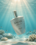 Snoir perfume bottle underwater with sunlight beams